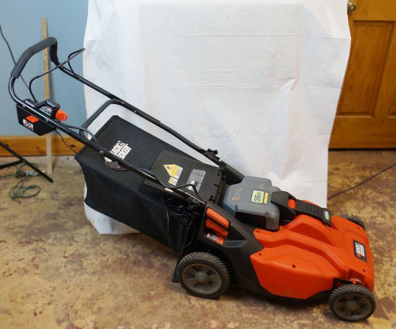 lot 6771 image: Black & Decker Cordless Electric Lawnmower 36 Volts - with Charger