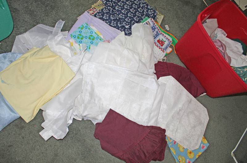 lot 8506 image: Lot of Assorted Fabrics, Curtains and More