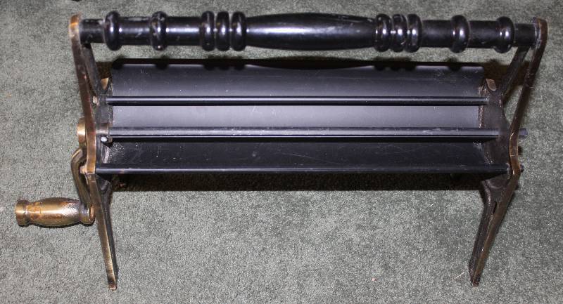 lot 8567 image: Newspaper Log Roller - Recycle and Save