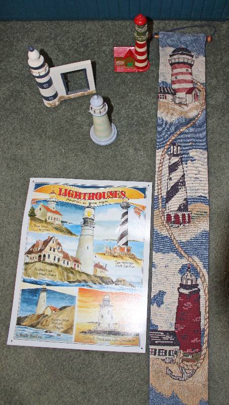 lot 8602 image: Assorted Lighthouse Dcor - Metal sign has some bend and creases