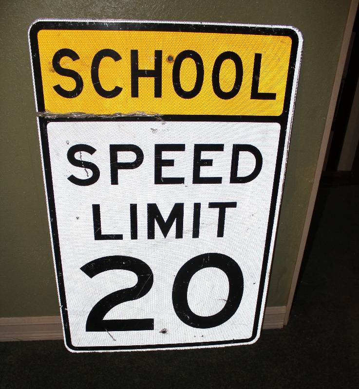 lot 8616 image: School Speed Limit Sign - (see damage on top where someone tried to cut the top off)