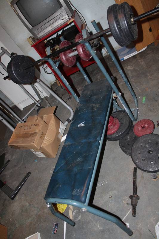 lot 8702 image: Weight Bench and Weights shown in Picture