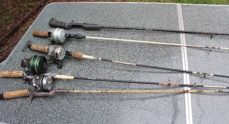 lot 8716 image: 4 Rods and Reels with one Additional Rod