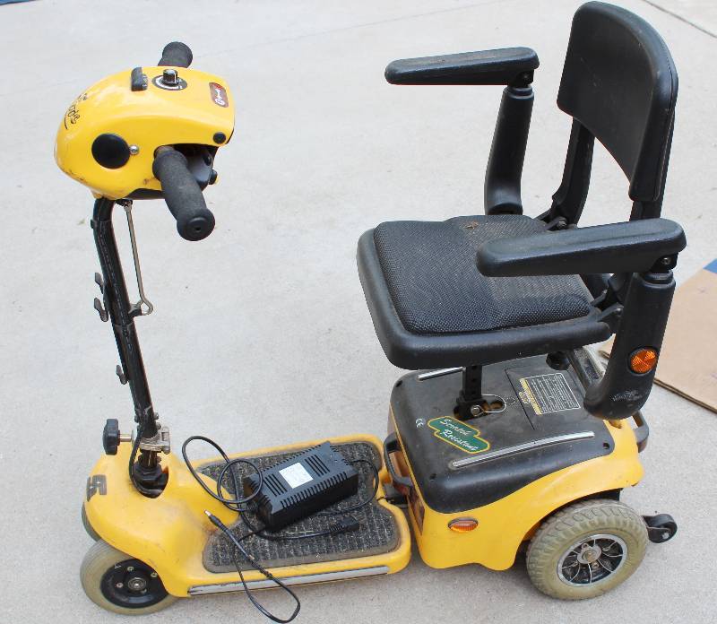 lot 8752 image: Yellow Scootie Scooter - Comes with Charger, but no key