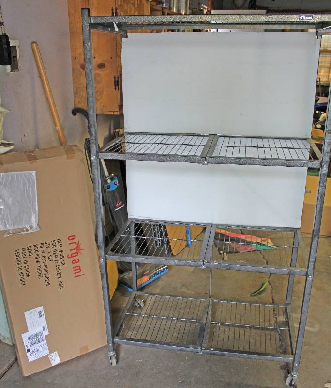 lot 8762 image: 2 Origami Rolling Shelf Units - Very Cool (1 is new in box)