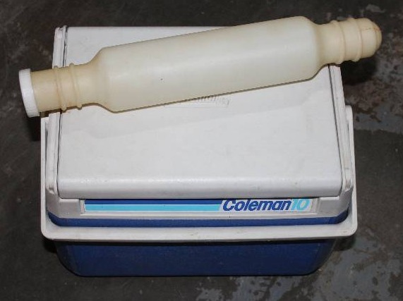 lot 8776 image: Coleman 10 Cooler and Plastic Rolling Pin