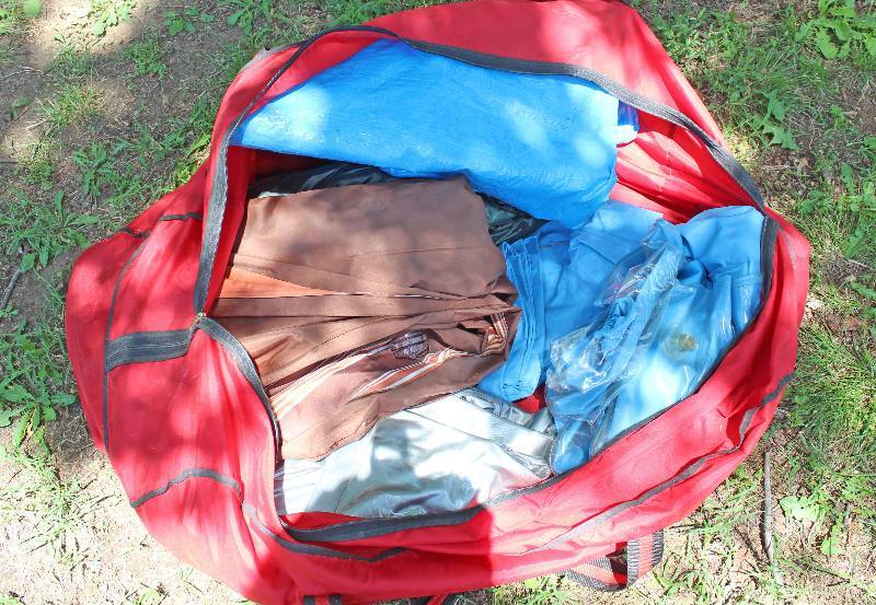 lot 8797 image: Duffle Bag with Air Mattresses and Tarps and Other Basic Camping Gear