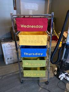 lot 16 image: Days of the week organizer caddy on wheels