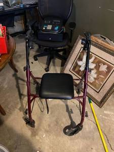lot 18 image: Walker for seniors with seat and large wheels- foldable