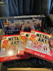 lot 63 image: (4) New toy sets