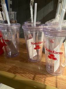 lot 110 image: Assortment of cups- 5 New State Farm reusable cups, Dixie stampede collectors cup, fire hydrant container and other plastic cups
