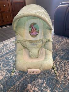 lot 120 image: Winnie the Pooh bouncy chair