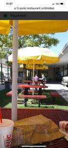 lot 126 image: (2) Sonic- Americas favorite drive in picnic tables umbrella- Brand new
