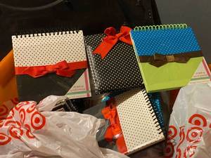 lot 138 image: Tote full of stationary notepads. Great for gifting of groups