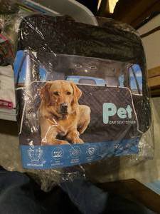 lot 143 image: Pet car seat cover- New