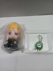 lot 56360 image: Tokyo Revengers Takemichi Hugmy Vinyl Figure with Tamagotchi Nano Digital Pet
