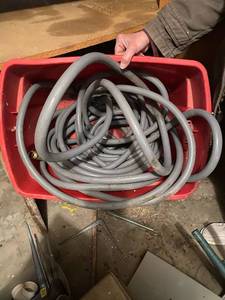 lot 235 image: Garden hose- unsure on length but it is long
