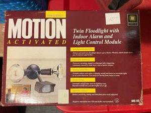 lot 273 image: Motion activated twin flood light with alarm