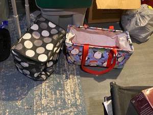 lot 276 image: Large Christmas tote and 1 soft side cooler on wheels