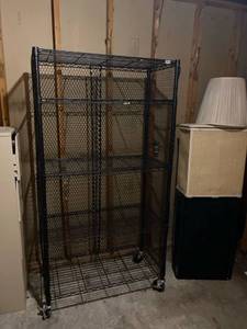 lot 2690 image: Black (4) shelf rack on wheels