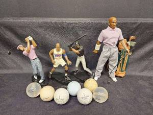 lot 232 image: Vintage 1996 Michael Jordan Golf Figure and Michael Jordans Space Jam Triple Play