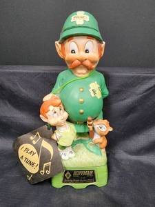 lot 100 image: 1975 Hoffman Distilling Co. Mr. Lucky Series Irish Policeman Music Box