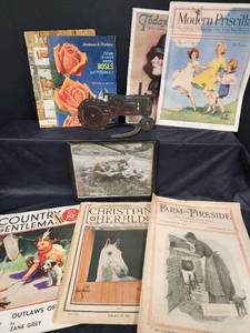 lot 112 image: Vintage Magazines and Papers, Metal Cut Out Silhouette Tractor and More