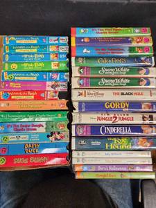 lot 145 image: Childrens VHS Tapes and 4 DVDs