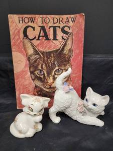 lot 451 image: 2 Porcelain Cats and A Book