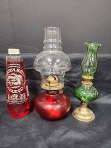lot 481 image: 2 Vintage Oil Lamps and Cherry Scented Lamp Oil