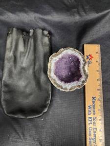 lot 496 image: Beautiful Purple Geode Half with Black Leather Pouch