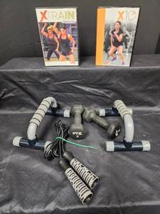 lot 509 image: Exercise Equipment with 2 Workout DVDs