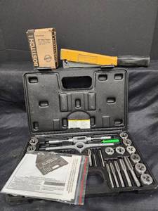 lot 562 image: Bostitch Stapler, Staples and Carbon Steel Tap and Die Set (incomplete)