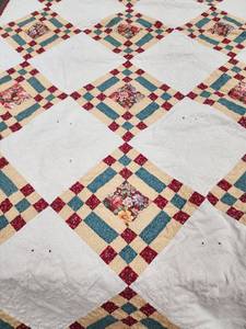 lot 10 image: Vintage Handmade Floral Diamond Pattern Quilt 72in. x 96in.