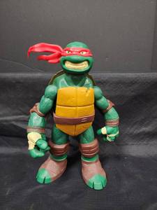lot 22 image: Teenage Mutant Ninja Turtles Raphael Action Figure