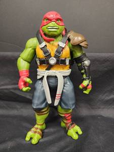 lot 24 image: Teenage Mutant Ninja Turtles Action Figure - Raphael Movie Version