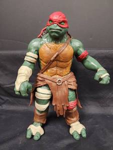 lot 25 image: Teenage Mutant Ninja Turtles Raphael Action Figure - Large Scale