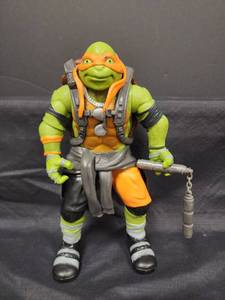 lot 26 image: Teenage Mutant Ninja Turtles Michelangelo Action Figure - Out of the Shadows Movie Edition