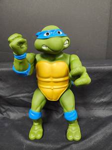 lot 28 image: Vintage Teenage Mutant Ninja Turtles Action Figure - Blue Bandana