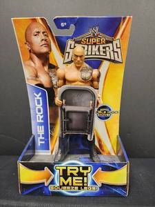 lot 31 image: WWE Super Strikers Action Figure with Chair Accessory