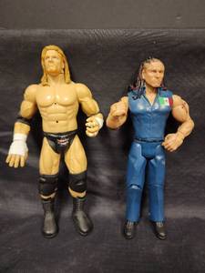 lot 32 image: WWE Wrestling Action Figures - Triple H and Mexican Wrestler Set