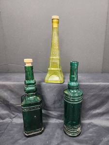 lot 53 image: Vintage Decorative Glass Bottles Collection - Eiffel Tower and Green Bottles
