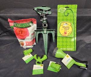 lot 652 image: Garden Supplies Bundle - Yard Smith Sprinkler, Jobes Fertilizer, Disney Marker & Hose Accessories