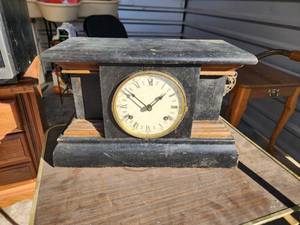 lot 707 image: Antique Black Wooden Mantel Clock with Roman Numeral Face