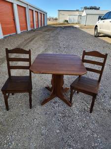 lot 816 image: Solid Wood Pedestal Dining Table with Two Ladder Back Chairs