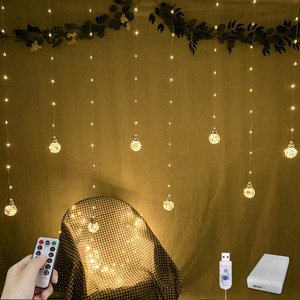 lot 7627107 image: YOLIGHT Wishing Ball Curtain Lights 200 LED Window Curtain String Lights with Remote, USB Battery Powered Twinkle Globe Fairy Lights for Wedding Party Bedroom Christmas Decoration (Warm White)