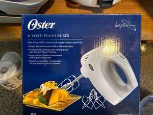 lot 7575 image: Oster 6 Speed Hand Mixer 2532