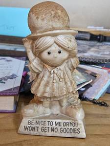 lot 7606 image: Vintage Ceramic Figurine with Humorous Quote
