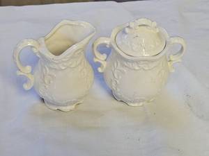 lot 7644 image: Vintage White Ceramic Cream and Sugar Set