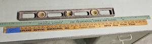 lot 7719 image: Vintage Level and Insurance Company Ruler Set